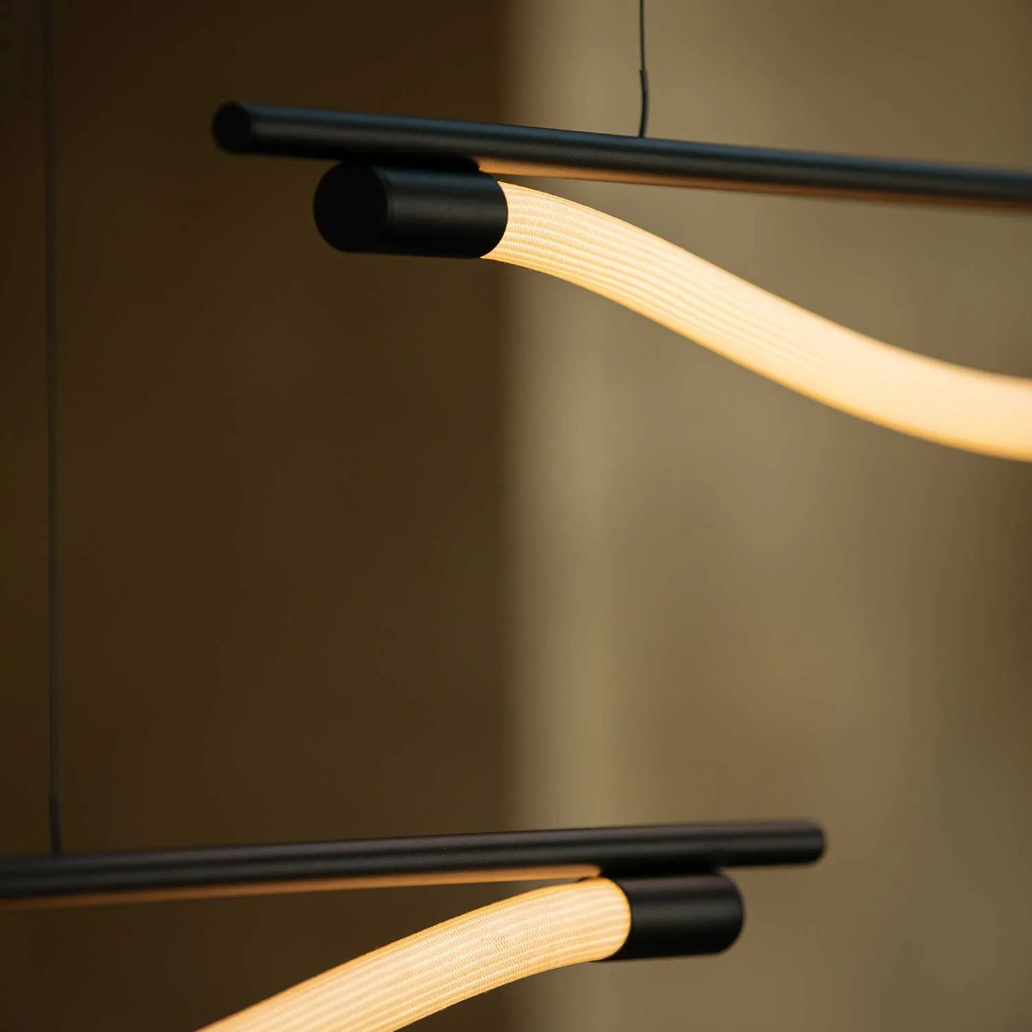 Levity Bow - Designer linear LED tube pendant light for dining room