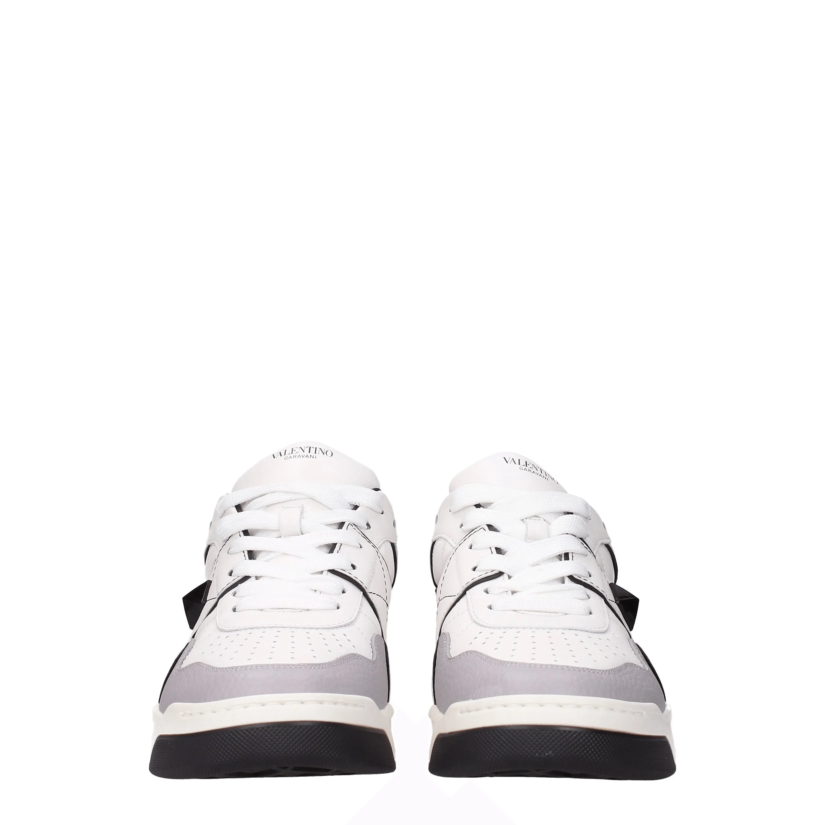 Valentino garavani baskets pour hommes blancs en cuir / noir